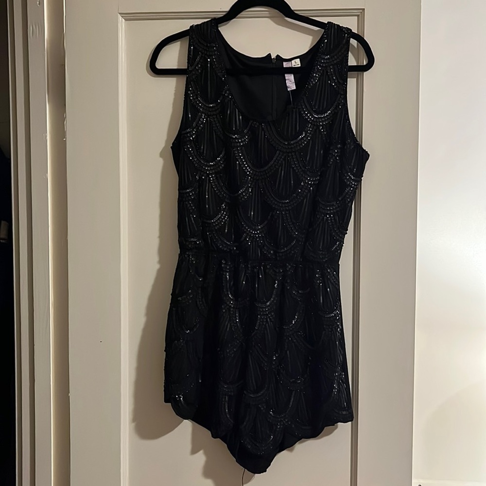Francesca’s black beaded romper